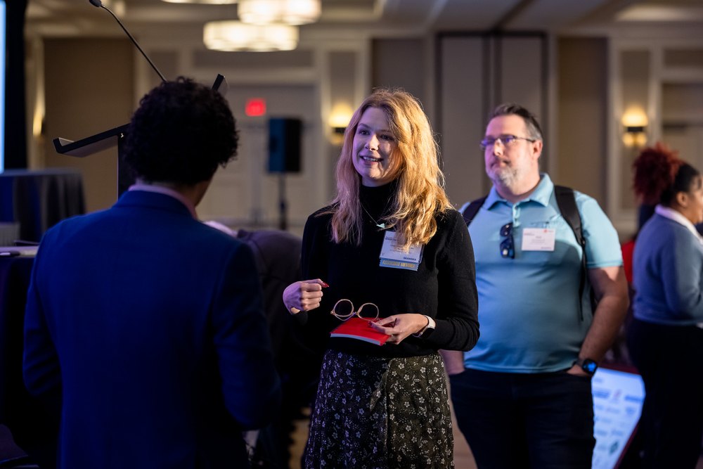 Dr. Mehdi in conversation with executives