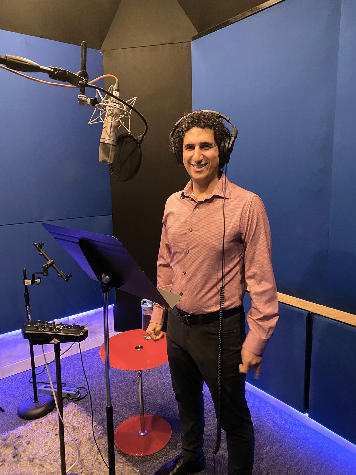 Dr. Mehdi recording a podcast